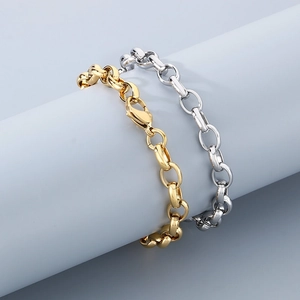 Polished gold and silver stainless steel rolo link bracelets with lobster clasps on display