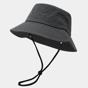 Close-up of dark grey sun hat featuring breathable laser-cut mesh and windproof cord