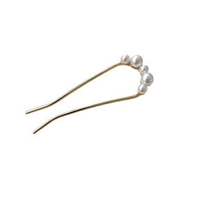 Elegant gold U-shaped metal hair pin with five graduated white pearls for bun styling