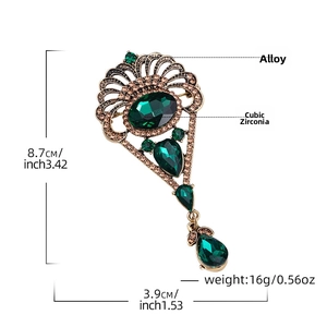 Detailed size and weight dimensions for vintage green rhinestone animal brooch jewelry