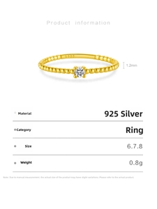 Detailed view of 925 sterling silver gold plated bead ring with round zircon stone