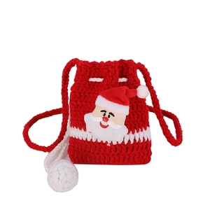 Handmade crochet Christmas reindeer crossbody bag for kids with festive red and white design