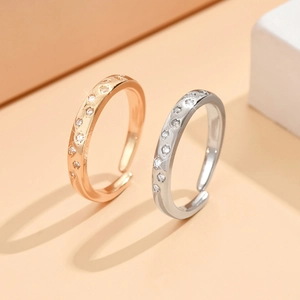 Adjustable sparkling star letter ring with rhinestones in rose gold and silver finishes