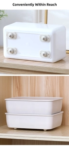 Macro shot of self-adhesive stainless steel ball casters on a storage box bottom
