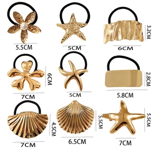 Detailed size guide for gold metal hair ties featuring starfish and floral charms