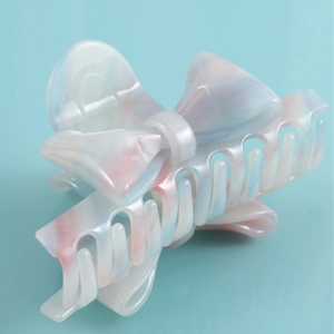 Elegant gradient acetate bow hair claw clip in white, blue, and pink for women
