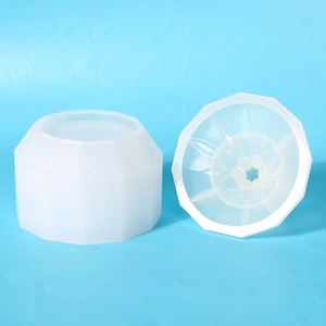 Macro view of textured lid and cylindrical translucent silicone storage box resin mold