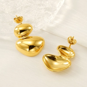Irregular geometric gold-plated earrings with double-layer oval pebble design on silk