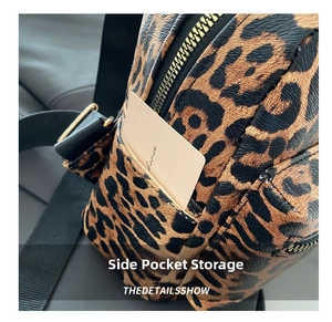 Detailed macro view of side pocket on leopard print leather backpack with pebble texture