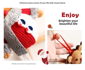 Detail of plush reindeer and snowman Christmas ornaments with knitted texture and red lanyards
