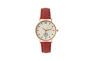 Detalle de correa de reloj de cuero rojo con caja oro rosa y esfera con subesfera pequeña