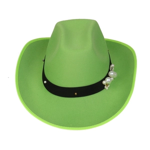 Detail of neon green wool felt cowboy hat featuring pearl and white flower band