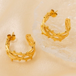 Orecchini vintage francesi in acciaio inossidabile dorato con design a maglia a spirale