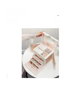 Multi-layer white leather jewelry box with mirrors, velvet lining, and necklace wings
