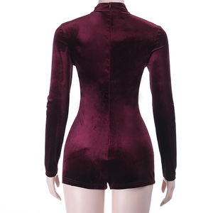 Detail view of burgundy velvet long-sleeve bodysuit featuring a back zipper closure