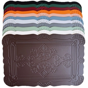 Faux leather placemats with vintage embossed baroque patterns and wavy edges