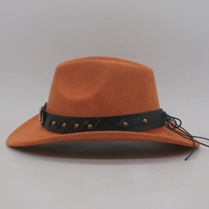 Detail of caramel suede cowboy hat featuring a black faux leather band with gold rivets