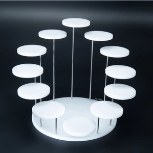 Detailed view of white acrylic 12-tier spiral jewelry display stand with metal support rods