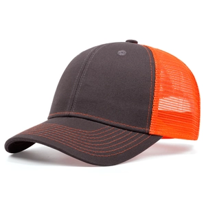 Detail of grey cotton brim and orange mesh back on a breathable trucker baseball cap