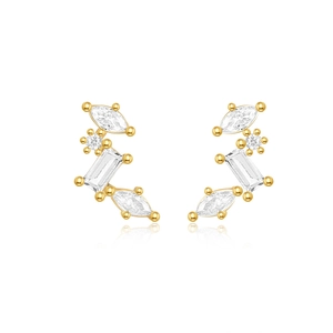 Detail of gold studs featuring marquise and rectangular cubic zirconia with reflections