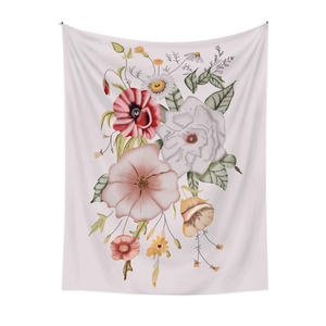 Close-up of floral tapestry showing watercolor flower print on soft cream fabric