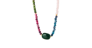 Detail view of handmade beaded necklace with green oval stone and multi-color faceted gems