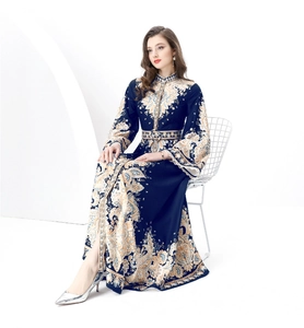 Detailed view of the court style retro stand collar and paisley floral print on the dress