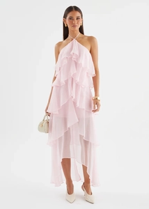Detail view of light pink ruffled halter dress in premium flowing chiffon fabric