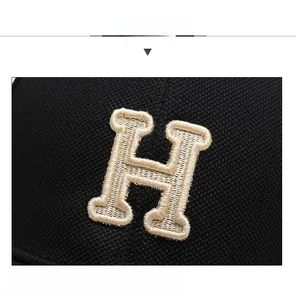 Detailed view of high-quality mesh baseball cap with premium embroidered letter H logo