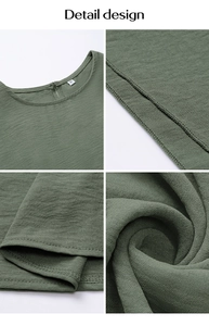 Détails de la robe vert herbe montrant l'étiquette XS et la qualité des coutures
