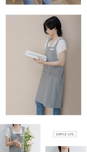 Detail of grey H-shape cotton linen apron with pockets and wide shoulder straps