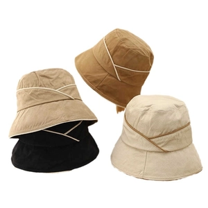 Minimalist cotton linen sun hats for women in four colors with cross-strap detail