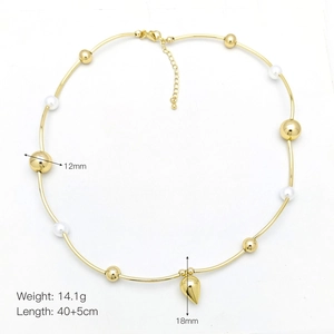 Detail showing 12mm pearls and 18mm gold teardrop pendant necklace dimensions