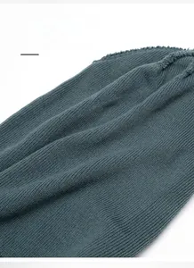 Detailed view of the dense knitted texture and warm inner lining of the winter beanie