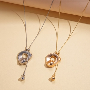 Minimalist geometric organic pendant necklaces in gold and silver finish on long snake chains