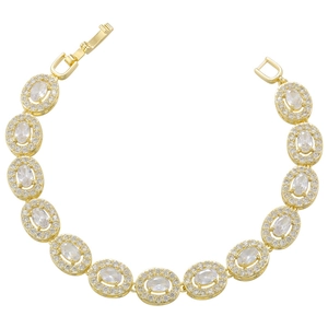 Detail of gold hip hop bracelet showing oval zircon links and secure folding clasp closure