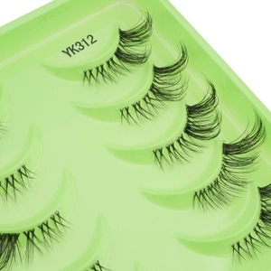 Close-up of YK312 natural thick half false eyelashes in a green plastic box