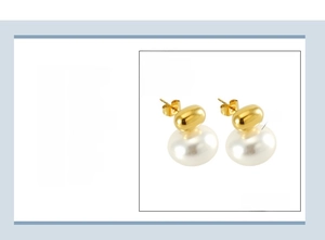 Detailed view of French vintage 18K gold plated stainless steel pearl stud earrings