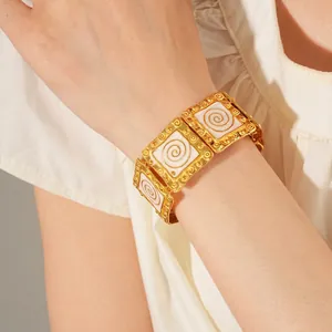 Vintage gold-plated square link bracelet with white enamel spiral pattern for women