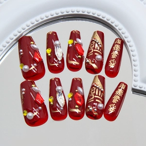 Festive red press-on nails with gold lucky characters and sparkling 3D rhinestones