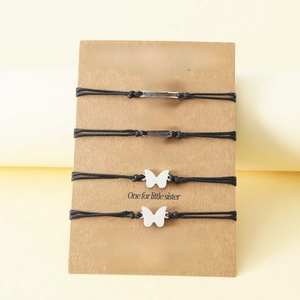 Set of four stainless steel butterfly bracelets on Mother and Daughters gift card