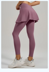 Detail of high-waist lavender yoga leggings with layered anti-exposure skirt design