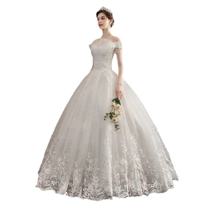 Elegant off-shoulder bridal gown with floral lace embroidery and a classic ball gown skirt