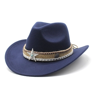 Close-up of navy wool cowboy hat featuring a silver star badge and turquoise bead detail