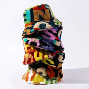 Colorful plush faux fur bucket hats with graffiti letters in street style designs