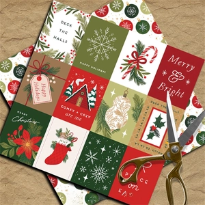 Macro shot of vintage Christmas paper set with snowflakes and scissors on kraft background