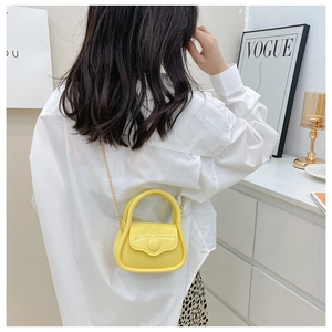 Mini macaron jelly crossbody bag in bright yellow with stylish metal chain strap
