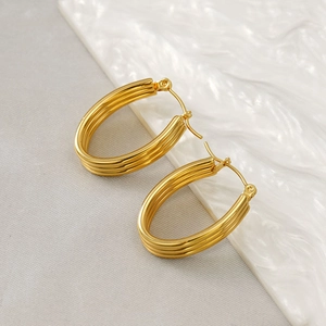 Three-layer gold oval hoop earrings in polished stainless steel for modern minimalist style