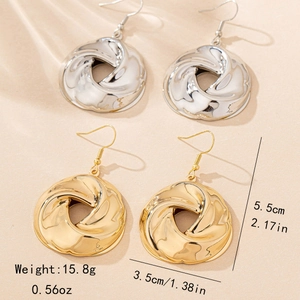 Polished twist hoop earrings in gold and silver, 5.5cm elegant spiral design