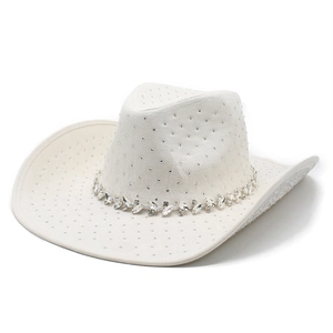 Close-up of white cowboy hat featuring rhinestone embellishments and a jeweled band